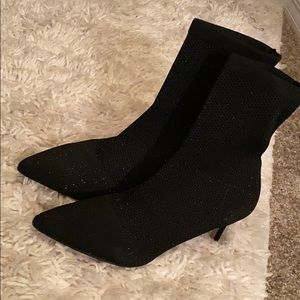 Glittery black sock style booties